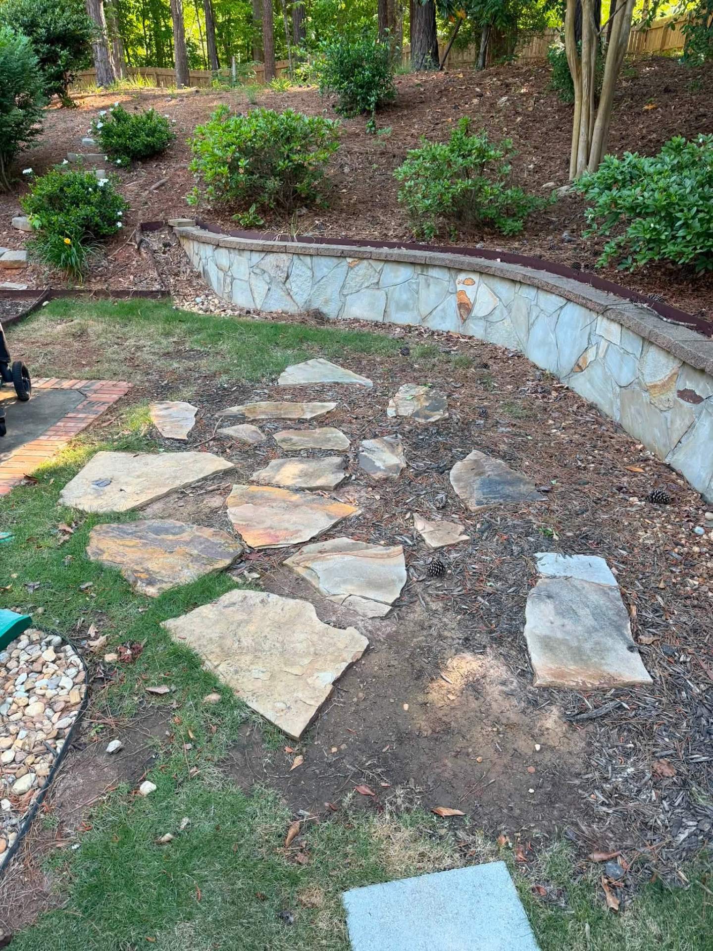 Stone Path & Mulch Bed Rebuild — before